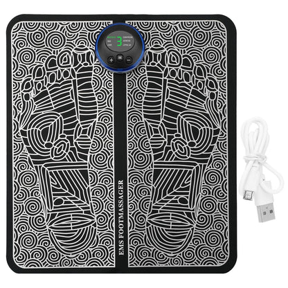 Black EMS foot massage pad with electric stimulator and USB cable on white background